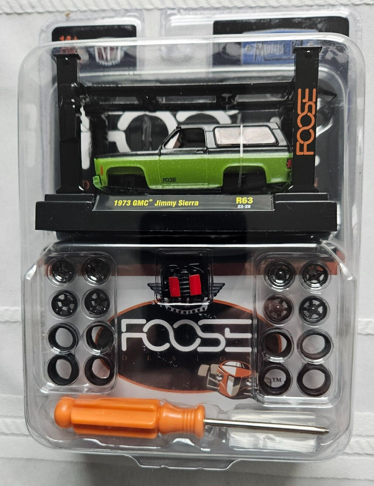 M2 Machines 1:64 Model-Kit FOOSE 1973 GMC JIMMY SIERRA CHASE